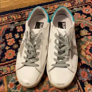 Women’s golden goose superstar sneakers